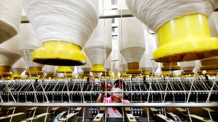 纺织企业开足马力促出产，针纺织品市场活力涌动